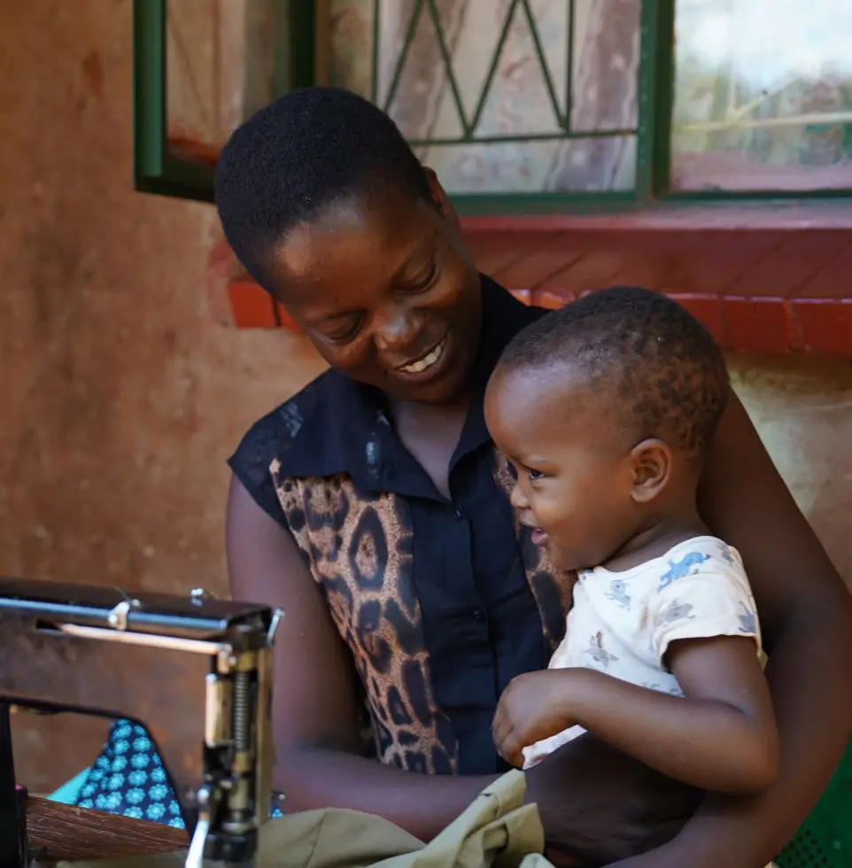 Children and caregivers gathered in a community setting