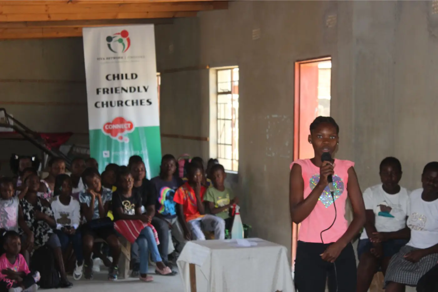 People participating in child friendly churches activities